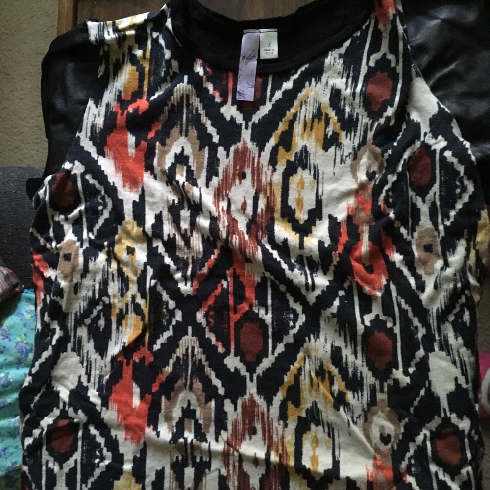 Short all top with faux leather sleeves